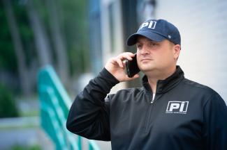 PI security guard on phone