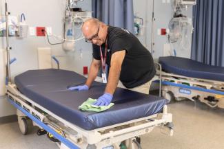 medical site wiping surfaces down