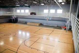 Wooden gym floor after high gloss treatment