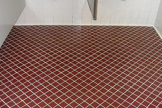 tile flooring in a bathroom after SaniGLAZE treatment is completed